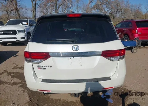 2014 Honda Odyssey Ex-L z USA, uszkodzony, nr VIN 5FNRL5H67EB099929